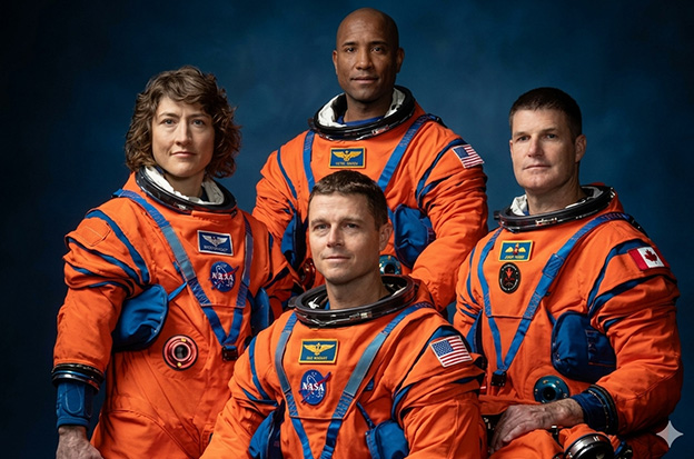 Man and Woman in Starliner Suit